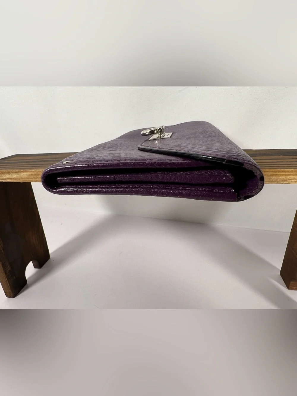 1039: Salvatore Ferragamo Gancini Continental Wallet Purple Leather